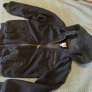 Sherpa lined canvas carhartt zip up jacket. Size large comfortable relaxed fit.